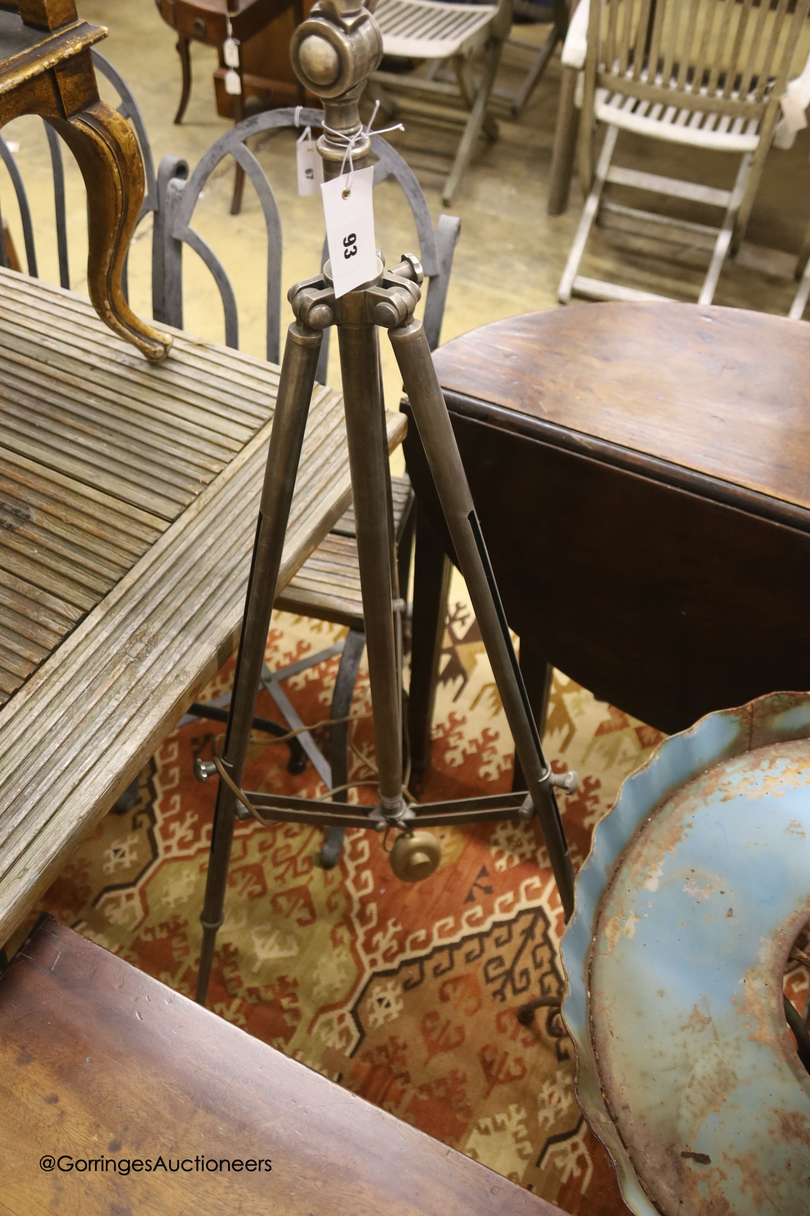 An Industrial style tripod standard lamp